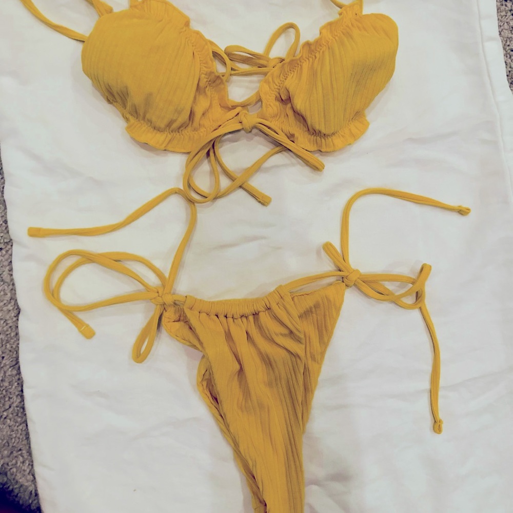 New bikini. Yellow/splash of burnt orange
